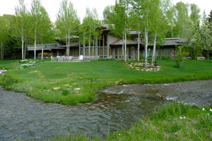 Exterior in springtime with natural trout stream