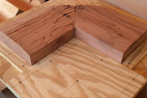 Redwood bases inserted into jig