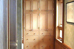 Grain sequenced pantry in hallway, note custom slotted vent in wood border in floor