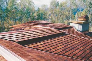 Finished roof with copper capped hips