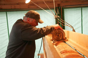 Using skill saw to cut column at various depths to profile shape